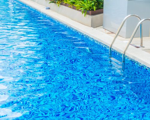 Beautiful luxury hotel swimming pool resort Beautiful luxury hotel swimming pool resort with umbrella and chair - Boost up color Processing